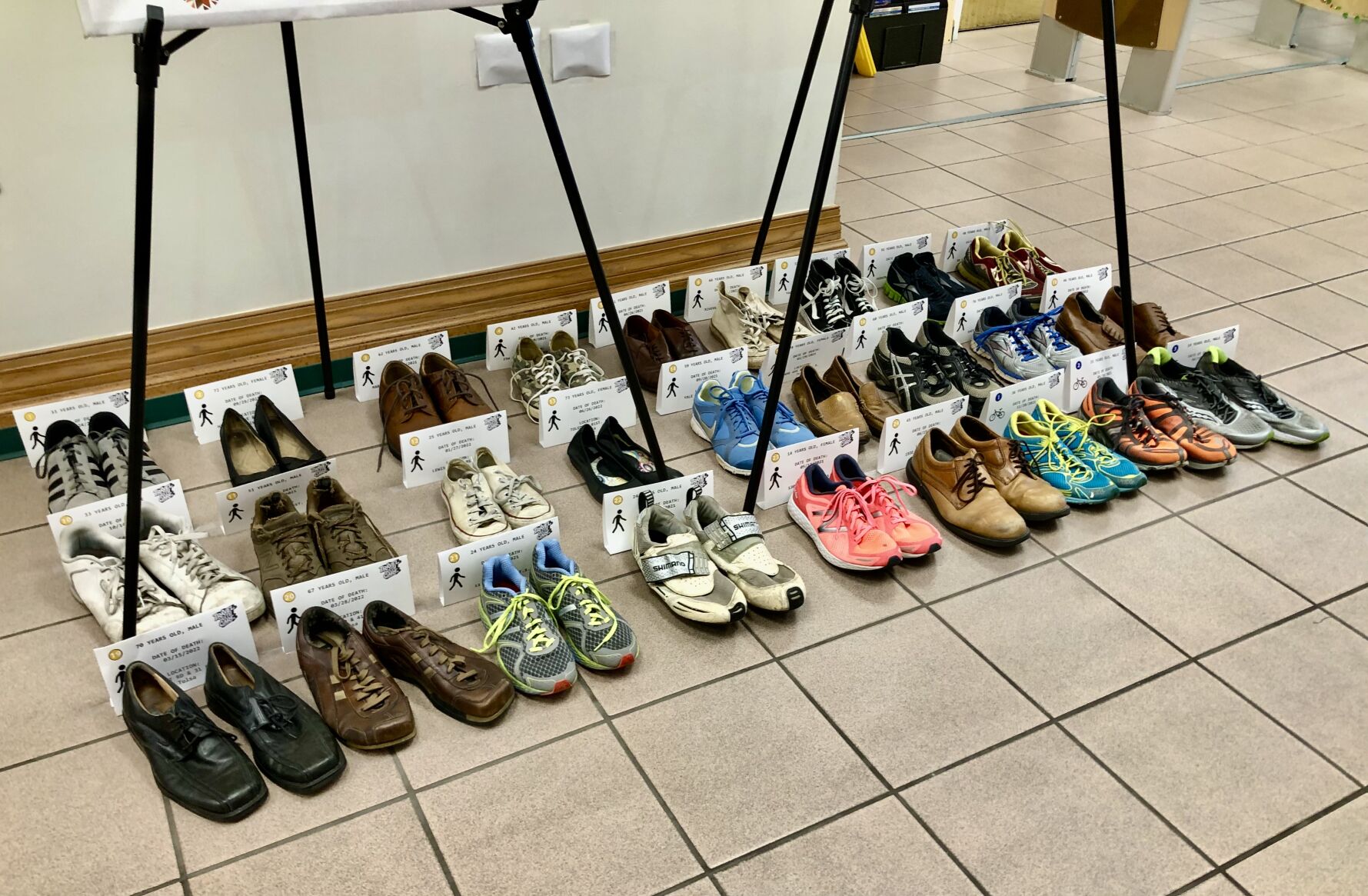 27 shoes representing pedestrians who were hit by cars